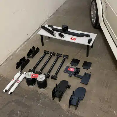 TA Technix Mk1 Caddy rear kit shown laid out on the workshop floor