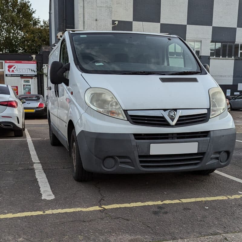 White X83 van in a car park