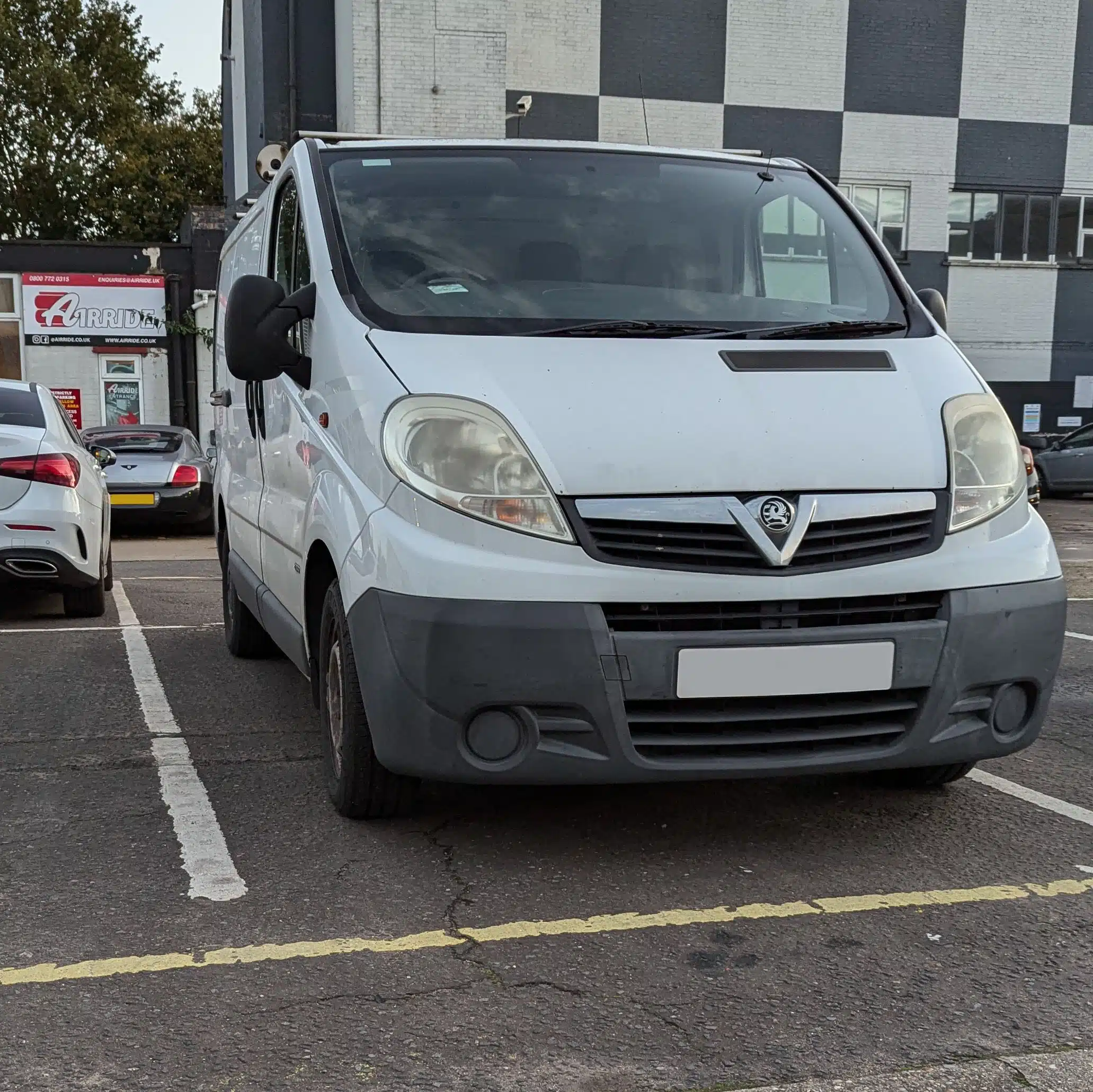 White X83 van in a car park