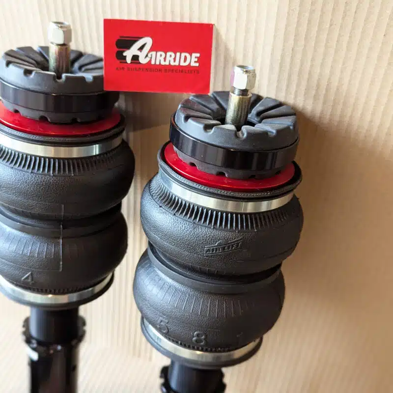 Close up of AirLift Performance Audi a5 S5 RS5 front struts
