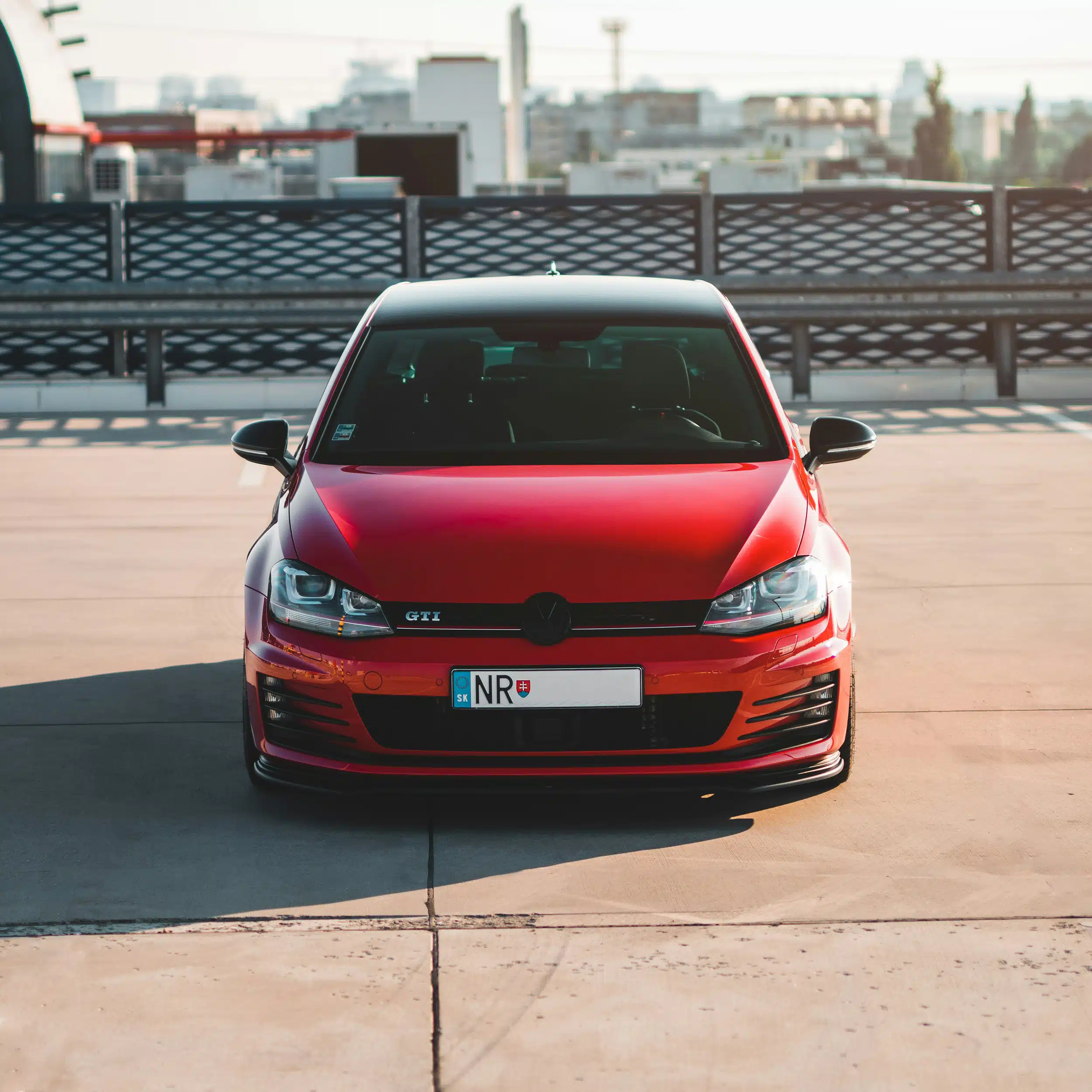 Lowered red VW Golf GTI