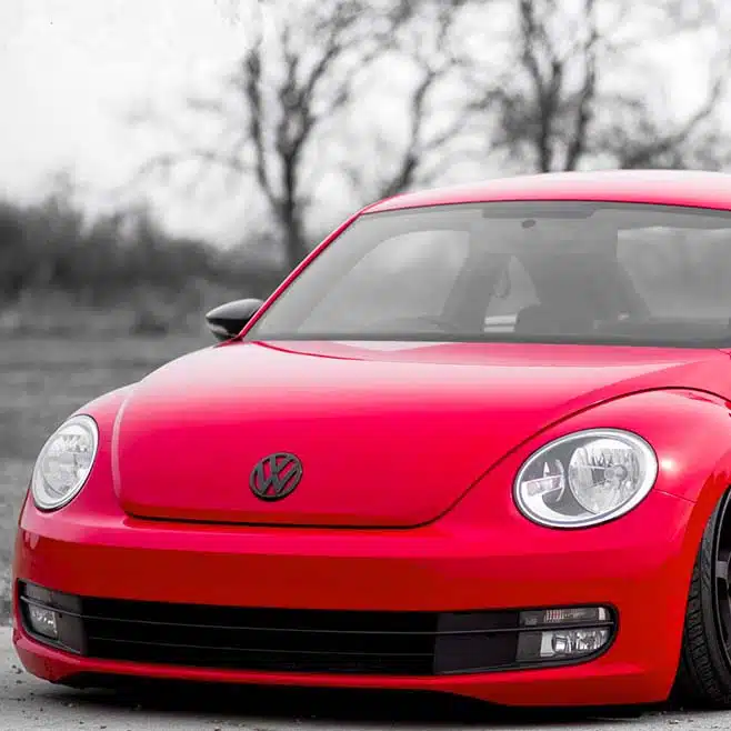 Lowered Red VW Beetle A5 parked outdoors