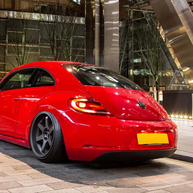 Lowered red VW Beetle A5 rear view
