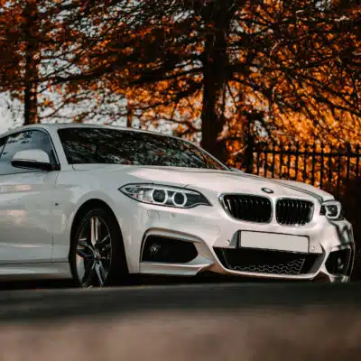 White BMW 2 series F22 parked outdoors