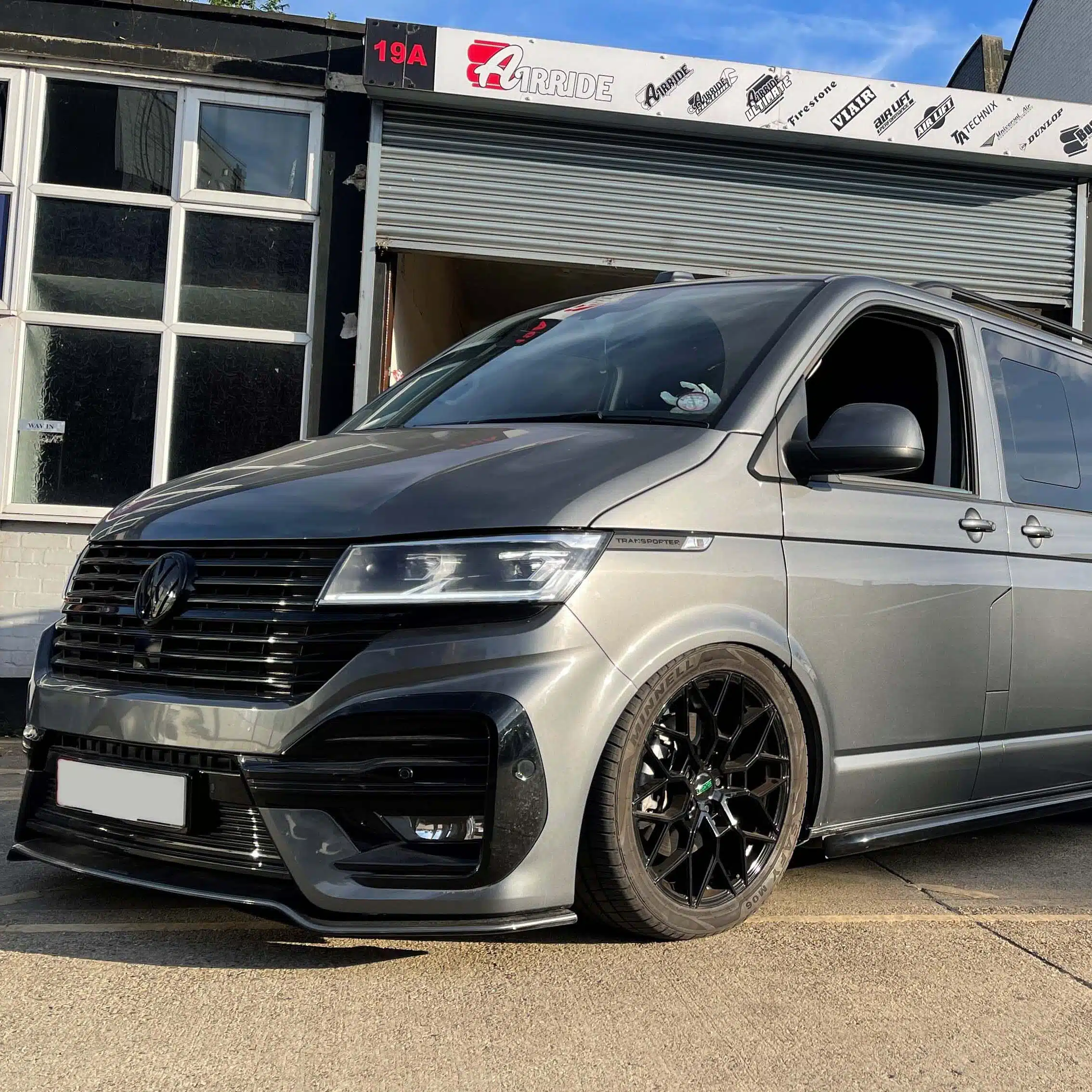 Lowered grey VW Transporter T6 outside AirRide