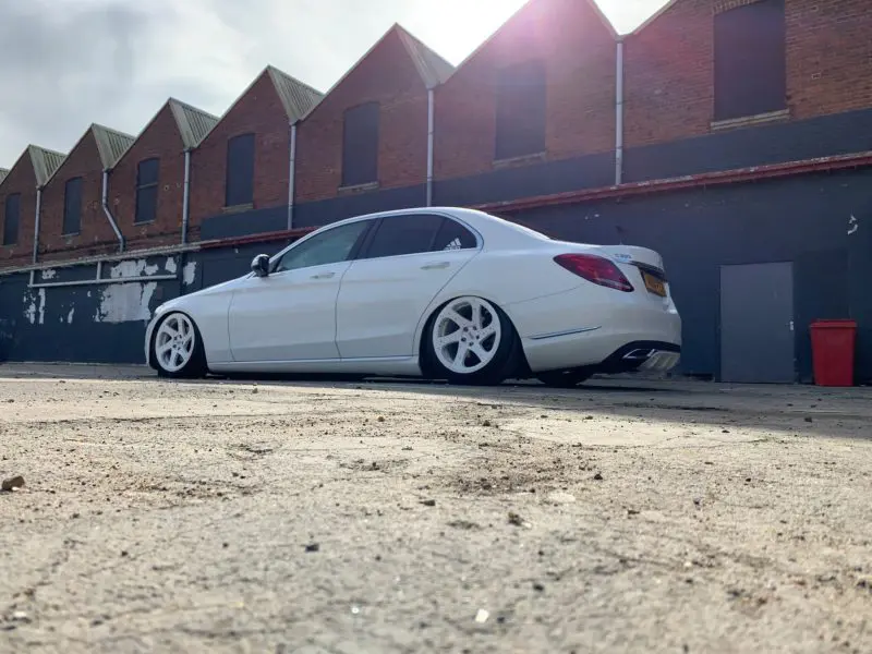 White mercedes C class looking very low on air suspension