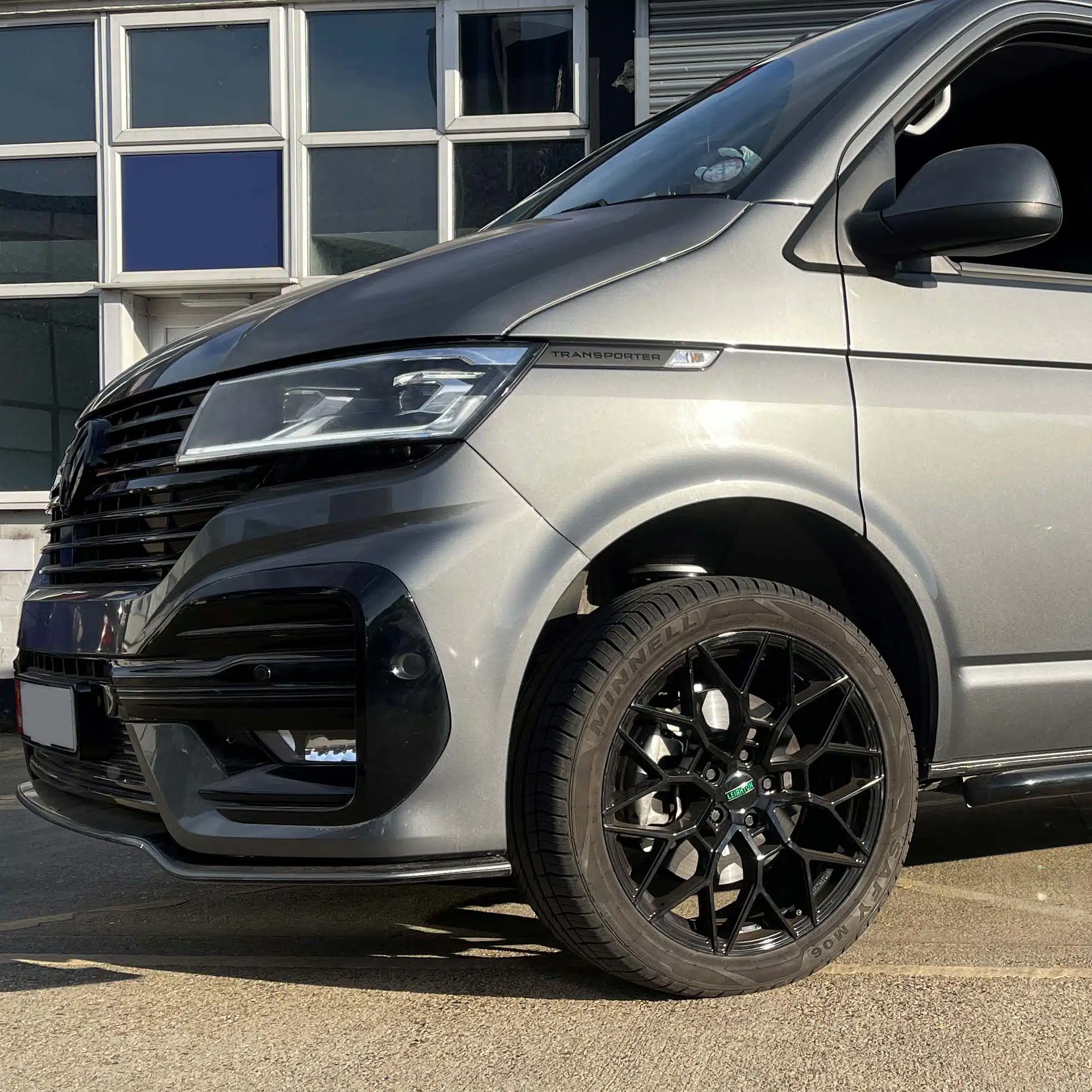 Close up of a lifted grey VW Transporter T6 front