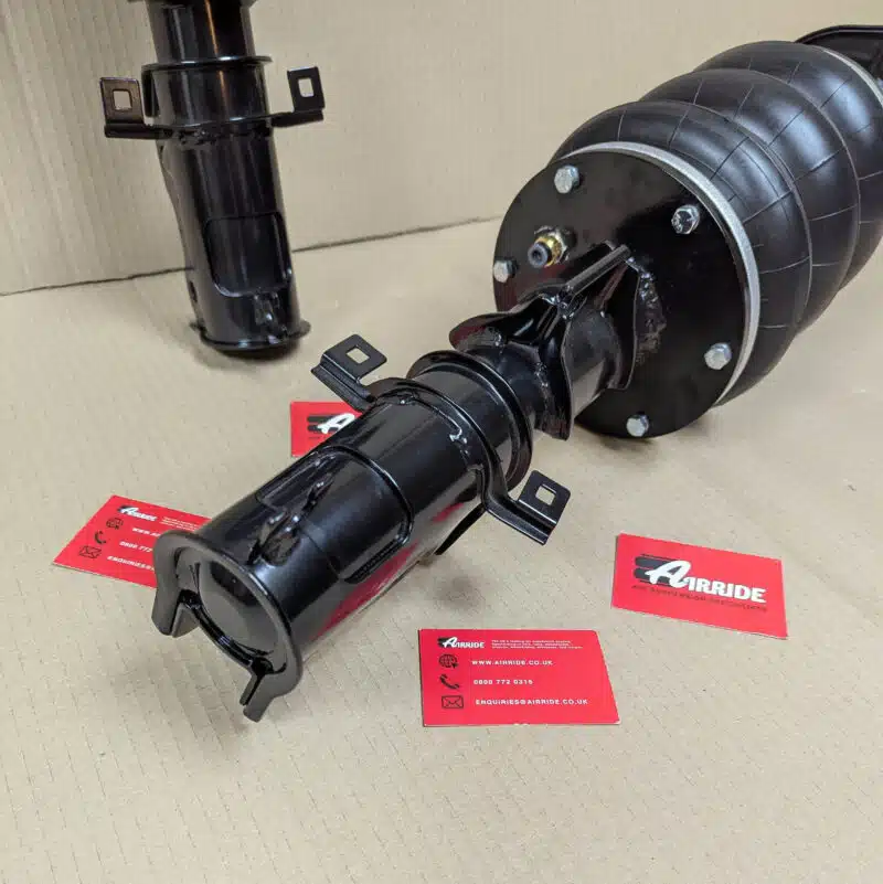Close up of Mercedes Vito W639 front air strut core on beige background