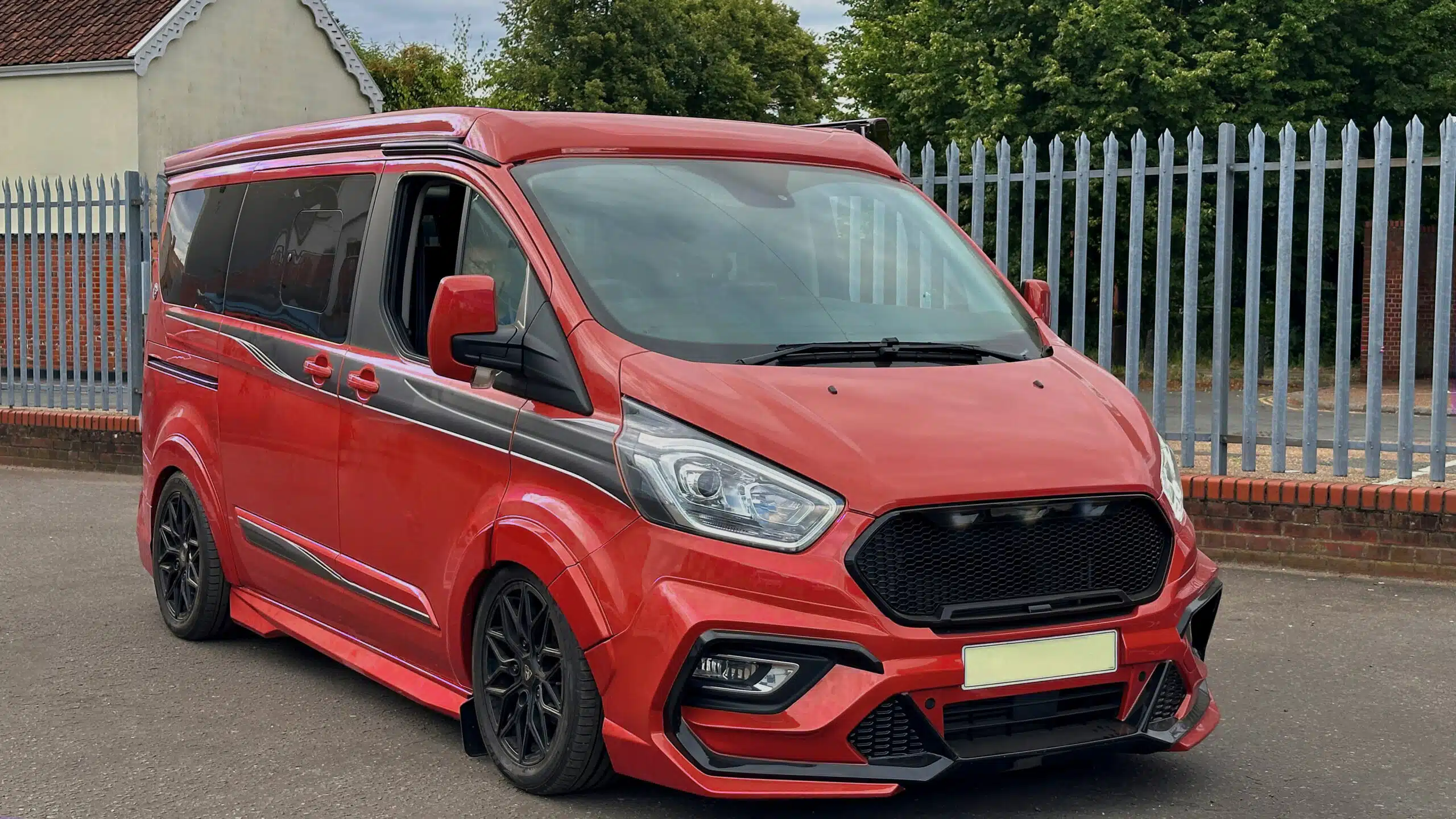 Ford Transit Custom in red with lowered suspension