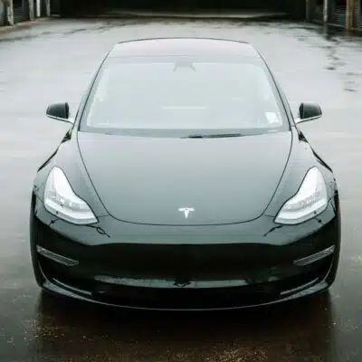 Black Tesla 3 shown parked