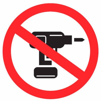 Black drill icon crossed out to indicate no drilling required
