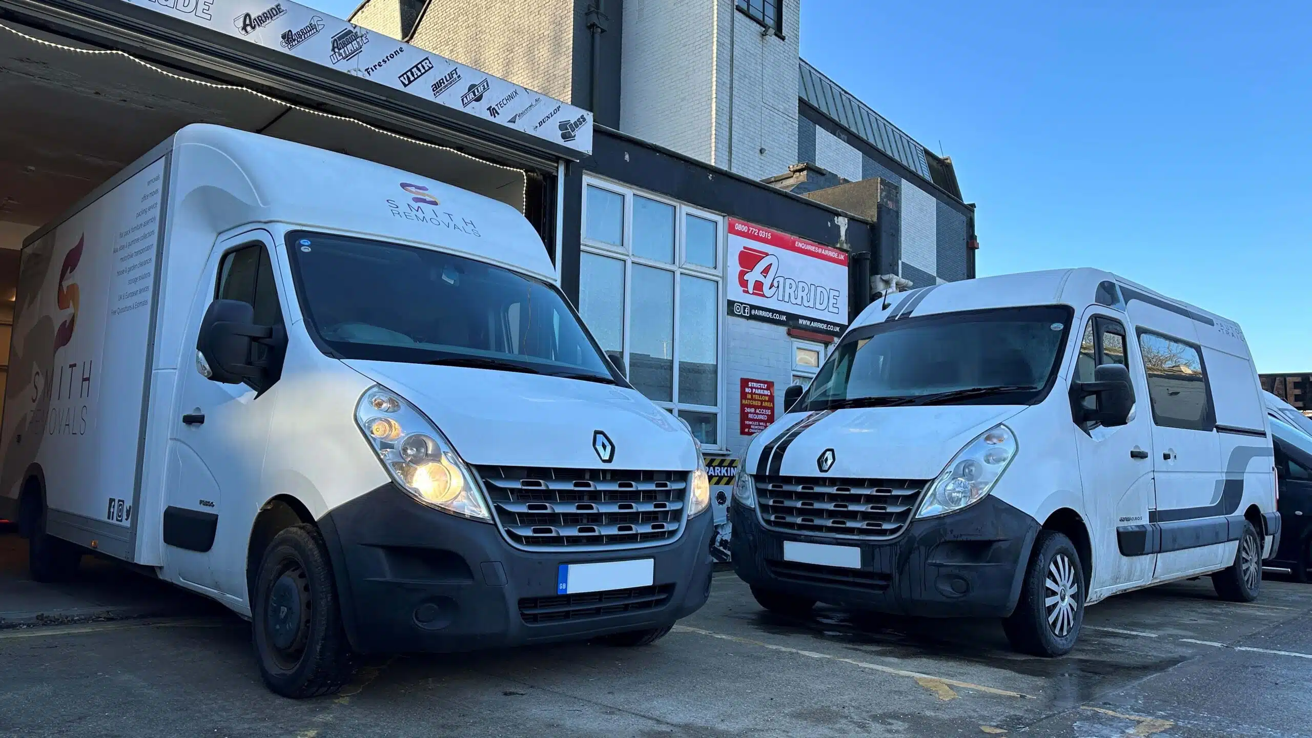 White Renault Master Luton van and camper vans outside AirRide