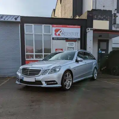 Silver S212 parked outside AirRide
