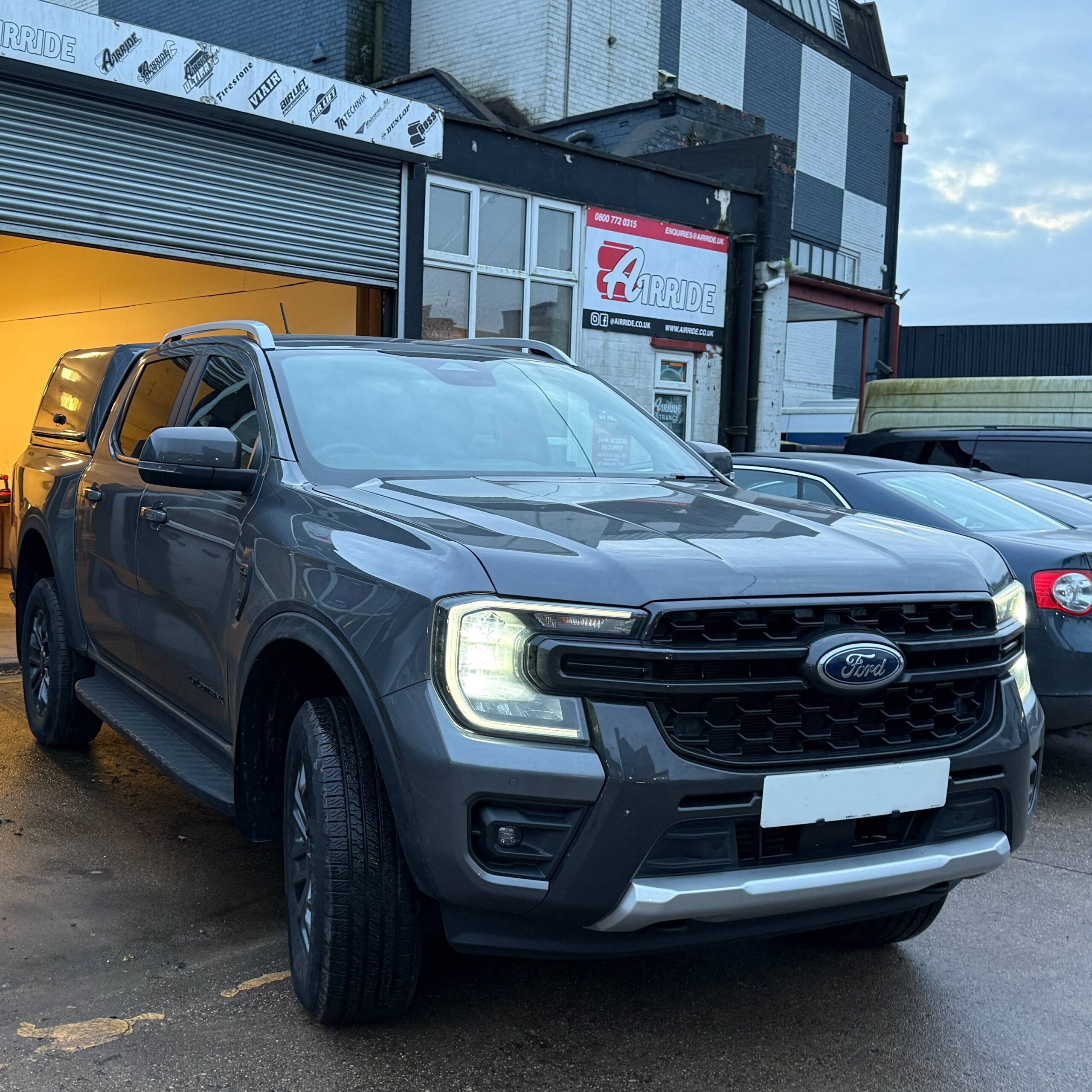 Grey Ford Ranger Wildtrack outside AirRide workshop