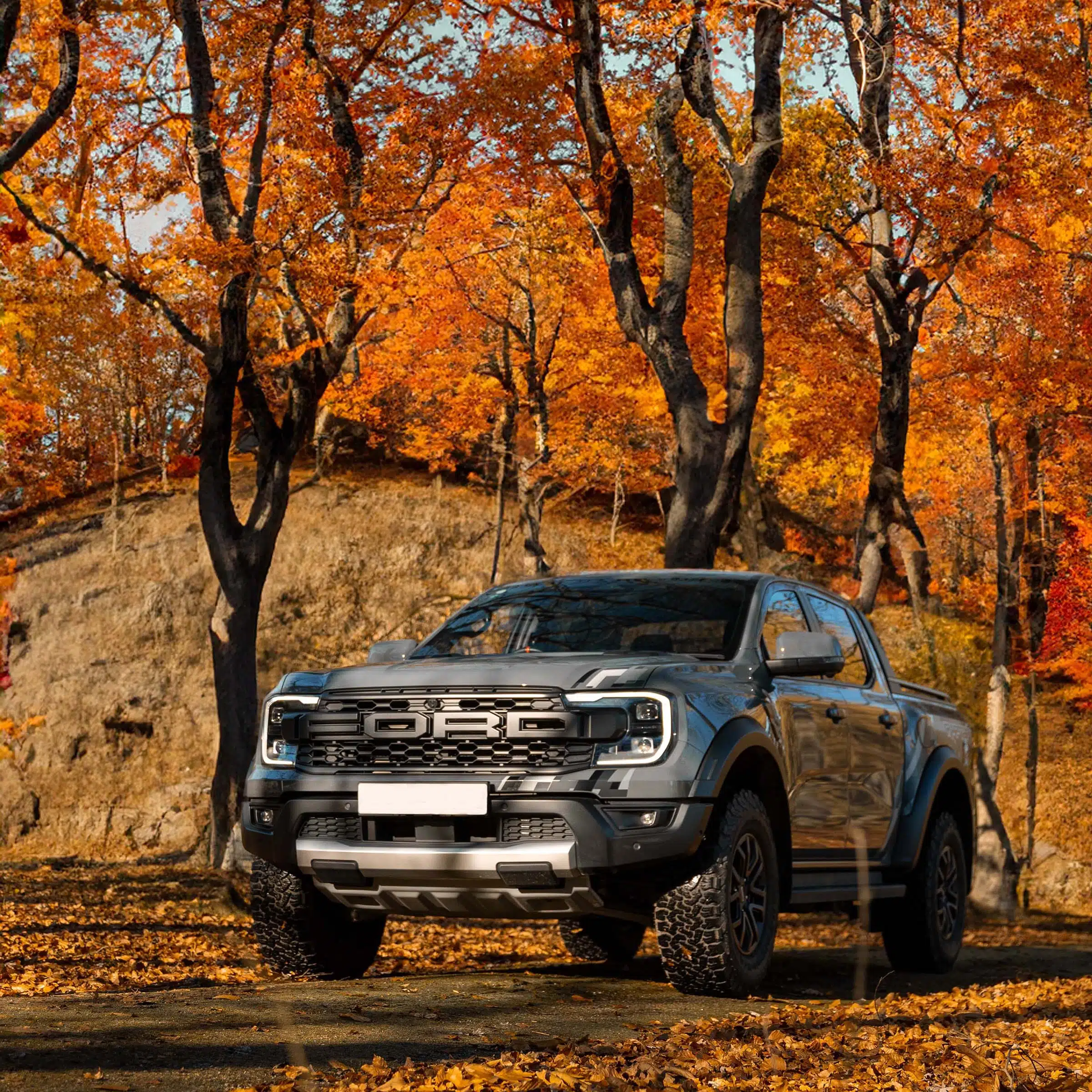 Gen 2 Ford Ranger Raptor parked in a leafy area