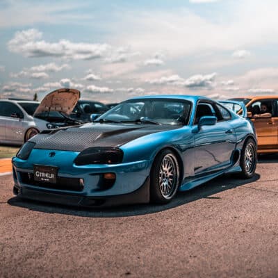 Toyota Supra Mk4 in a sunny parking lot Toyota Supra Mk4 in a sunny parking lot