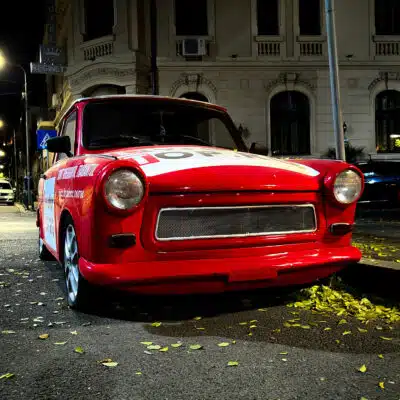 Red Trabant parked on the street