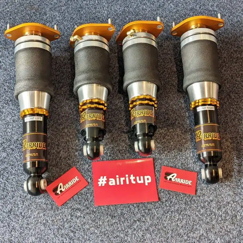 AirRide Gold Mazda MX-5 kit laid out on blue background