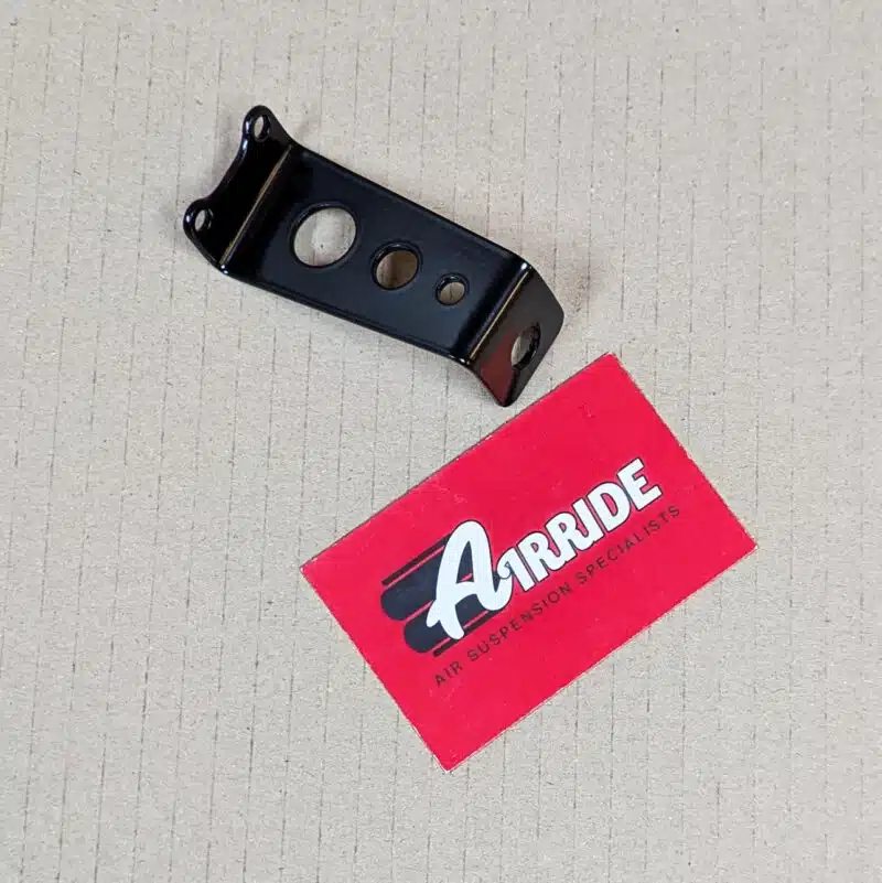 Water trap bracket on beige background