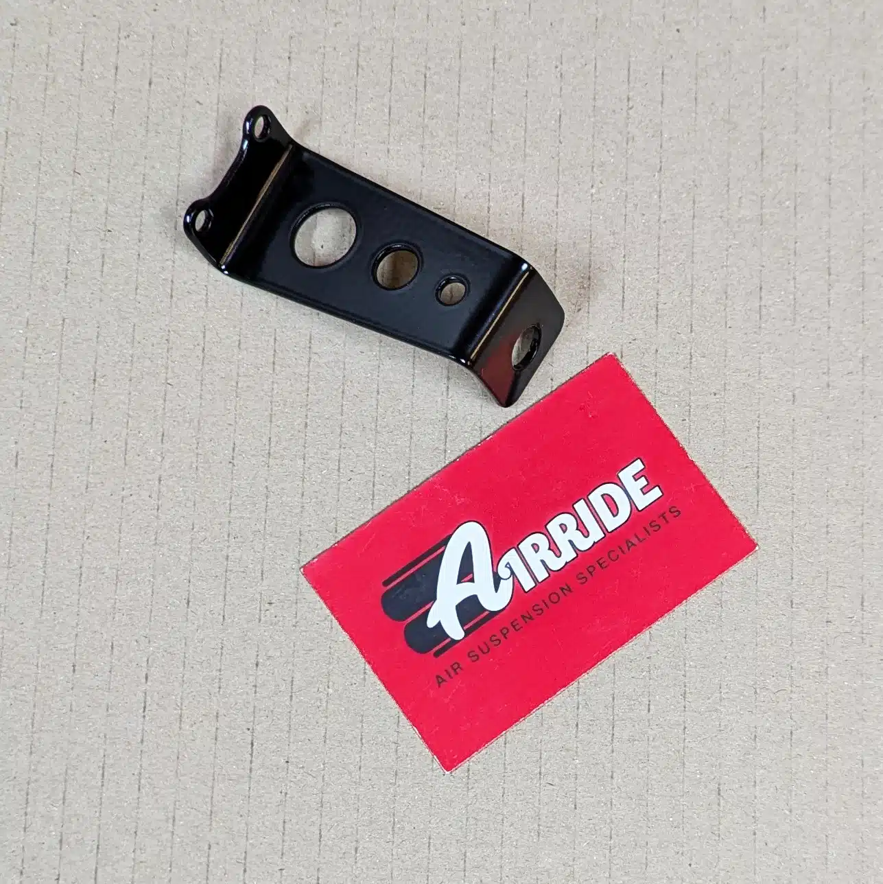 Water trap bracket on beige background