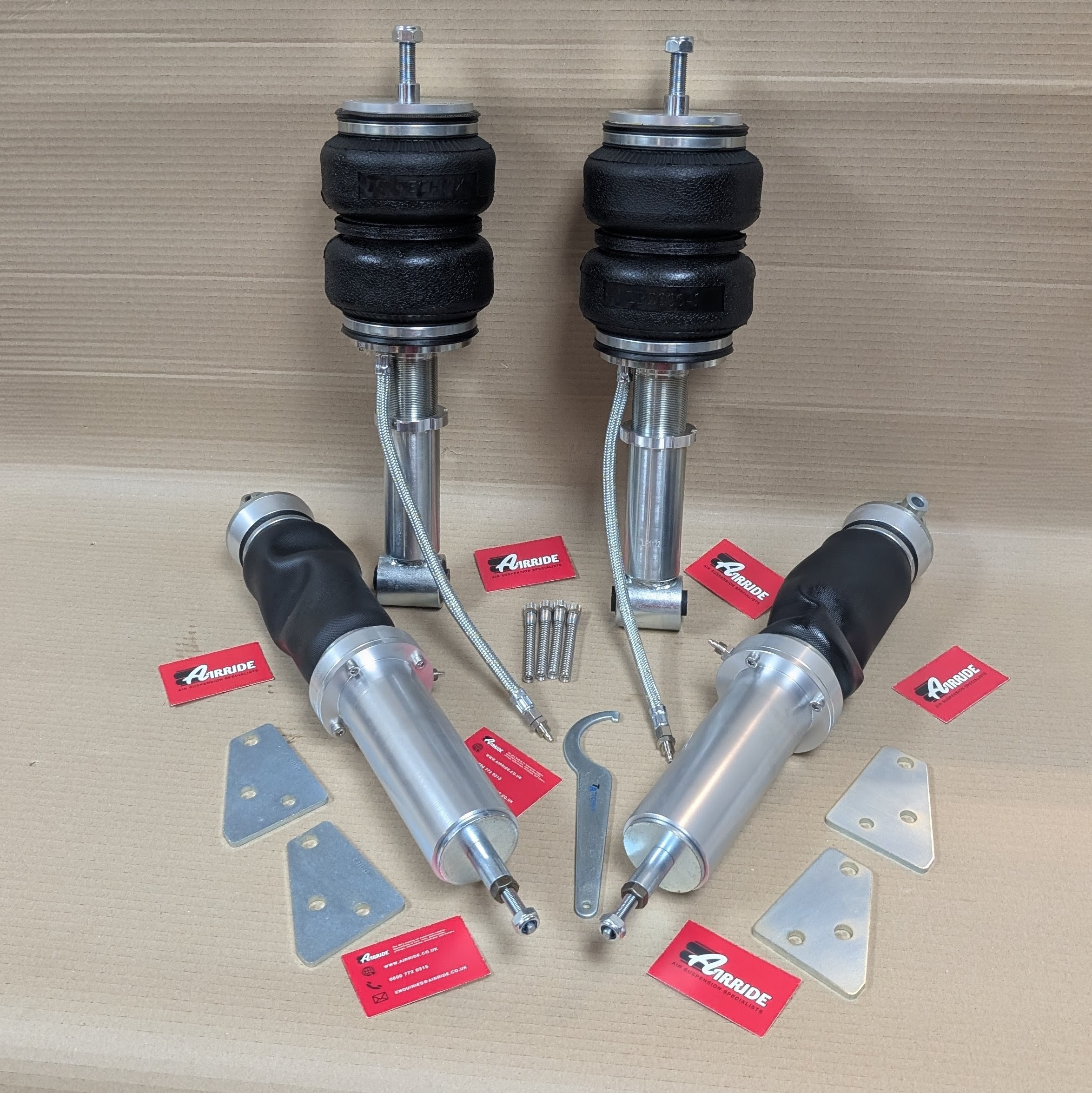 TA Technix Audi 100 C1 front and rear kit on beige background