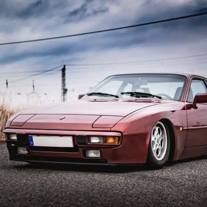 Lowered red Porsche 944